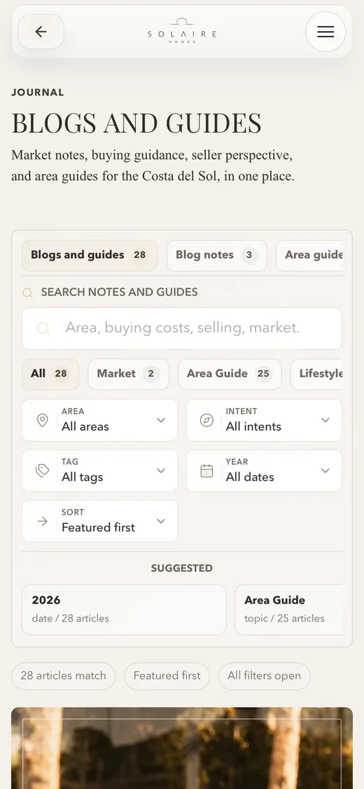 Blogs and guides on a phone: market notes and area guides, each with its painted picture